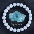 Macro detail of natural aquamarine bracelet featuring raw stone and polished blue beads - Aquamarine