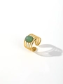 Macro detail of 18k gold plated stainless steel ring with green malachite stone inlay - Oval Large Gemstone Beaded Style / Gold