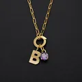 Goudkleurige roestvrijstalen halsketting met letter B en paars kristallen hanger - Letter B Stijl (Goud) / Goud