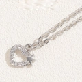Silver necklace featuring heart pendant with sparkling crown and cubic zirconia details - Crown Heart / Silver
