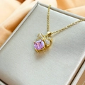 Detail of gold bow necklace with purple zircon and pave diamonds on jewelry box - FZ001-Bow Square Purple Zircon