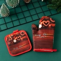 Detailed view of red Christmas oven mitt and pot holder with heart pattern - Wood Grain Heart