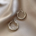 Polished silver geometric hoop earrings on champagne silk background for elegant styling - E5645 Silver Satin Finish Hoops