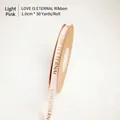 Light pink 1.0cm ribbon with gold LOVE IS ETERNAL print on 30 yards roll - 1.0cm Wide x 30 Yards Long / Light Pink