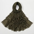 Dark green breathable bamboo cotton long scarf with fringes shown in a flat lay view - Army Green