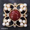Vintage gold brooch with large red stone, pearls, and crystals, size 4.8x4.8cm - Vintage Court