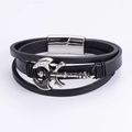 Men's multi-layer black leather bracelet featuring a silver axe charm and magnetic clasp - Axe