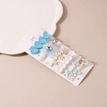 Detail of blue dopamine hair clip set with pearls, mesh petals and heart charms - Blue Collection (Style A)