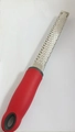 Stainless steel cheese grater with ergonomic red silicone handle and hanging hole - Heart Shape Red