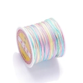 Macro shot of rainbow gradient jewelry cord spool for DIY handmade weaving projects - Color No. 4