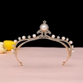 Detail view of baroque gold crown featuring white pearls and crystals on black background - No.3 KC Gold (White Stone)