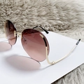 Fashionable rimless sunglasses with gradient brown lenses and slim golden metal frames - Gold Frame Tea Pink Gradient Lens