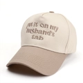 Detail of embroidered lettering on two-tone cotton baseball cap with adjustable strap - Khaki