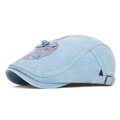 Berretto piatto in denim azzurro con patchwork floreale e fibbia in metallo bronzo - Azzurro