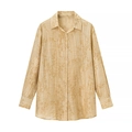 Dettaglio della camicia jacquard albicocca a maniche lunghe in tessuto floreale - Taglia S / Top / Giallo