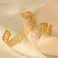 Detail of 18K gold-plated stainless steel jewelry set with hollow geometric lattice pattern - Hollow Style