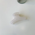 Close-up of a minimalist translucent milky white claw clip with a strong metal spring - Medium-8cm / Jelly White
