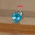 Macro view of 6mm sky blue heart-shaped zircon stud earring with stainless steel screw back - 6mm Silver Tone Blue Style (E1611)