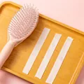 Disposable hair brush cleaning net sheets for pink paddle brush maintenance - Cleaning Net (50 Pieces)