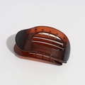 Translucent brown leopard print flat claw clip with hollow oval design and large comb teeth - Translucent Red Black