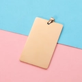 Close-up of polished rose gold rectangular pendant tag for DIY jewelry and engraving - Rose Gold With Clasp