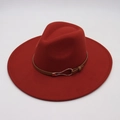 Close-up of the wine red wool fedora hat featuring a brown leather belt and gold buckle - Rust Red (Heart Buckle)