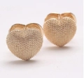 Elegant 18k gold plated heart studs featuring a textured beaded finish for a stylish look - Stud Earrings / Gold