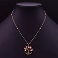 Golden Tree of Life necklace featuring white and red pearls on an elegant black bust - Tree of Life Wire Wrapped Necklace