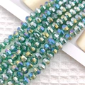 Close-up of faceted 8mm green AB coating glass beads for DIY jewelry making - Peacock Green AB