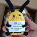 Handmade crochet bumblebee plush doll holding an inspirational card for gifts - Big Bottom Bee