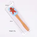 Spatola natalizia in silicone celeste con omino di pan di zenzero e manico in legno - Stile Omino di Pan di Zenzero Blu