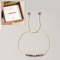 July birthstone ruby beaded bracelet with cream woven cord and adjustable slide knot - July-Ruby (Boxed Set)