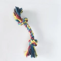 Close-up of the woven texture on a three-strand multi-color cotton rope dog chew toy - 25g 18cm Red Blue Yellow