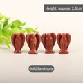 Handcarved 2.5cm goldstone angel figurines with shimmering red-brown sparkles - Gold Sandstone