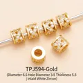 Macro view of gold-plated brass cylinder spacer beads with pavé cubic zirconia for DIY jewelry - TPJ594-White Zircon