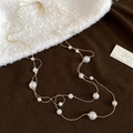Detailed macro of double-layer gold pearl necklace with adjustable lobster clasp closure - Gold Double Layer Long Pearl Necklace (Necklace-Gold-White)
