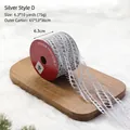 Silver mesh Christmas ribbon 6.3cm wide with sparkling snowflake pattern on a roll - Silver Style D (Silver Cutout Mesh)