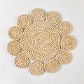 Macro detail of sunflower-shaped handmade woven corn husk heat-resistant table mat - 30cm / Style D