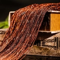 Flat silver thread door curtain in copper brown finish draped over vintage books - 1x2m / Coffee