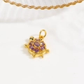 Macro view of 18k gold plated turtle pendant with vibrant purple zircon stones - Purple (Turtle Style B)
