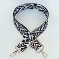 Close-up of black and white geometric jacquard bag strap with gold metal swivel hooks - Silver Clasp / Black Rainbow
