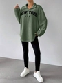 Detail view of sage green fleece pullover featuring New York embroidery and half-zip - S / Green