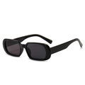 Occhiali da sole ovali piccoli in nero lucido per un look retrò e alla moda chic - Montatura Nera Lenti Grigio Nero