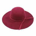 Detail of burgundy wide brim wool felt hat with decorative bow ribbon on plain background - One Size(58cm) / Burgundy