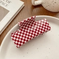 Minimalist rectangle hair claw clip with red and white checkered pattern on a ceramic plate - Red and White Grid 7.6CM