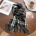 Thick black and grey plaid scarf with fringes on a cozy wooden table background - Black White & Gray Plaid Type 2 (WT143-6)