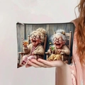 Detail of canvas pouch with retro illustration of women drinking, held by a woman - Old Ladies Drinking Style