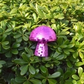 Macro shot of purple mushroom disco ball with reflective mirror tiles in green leaves - 10*10CM / Rose Red