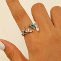 Macro shot of hummingbird ring with green teardrop stone and white cubic zirconia - Hummingbird With White Rhinestone Style (M-019)