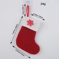 Classic red knitted Christmas stocking with snowflake embroidery and measurements - Snowflake Style